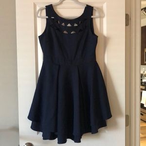 Navy cocktail dress with detailed neckline
